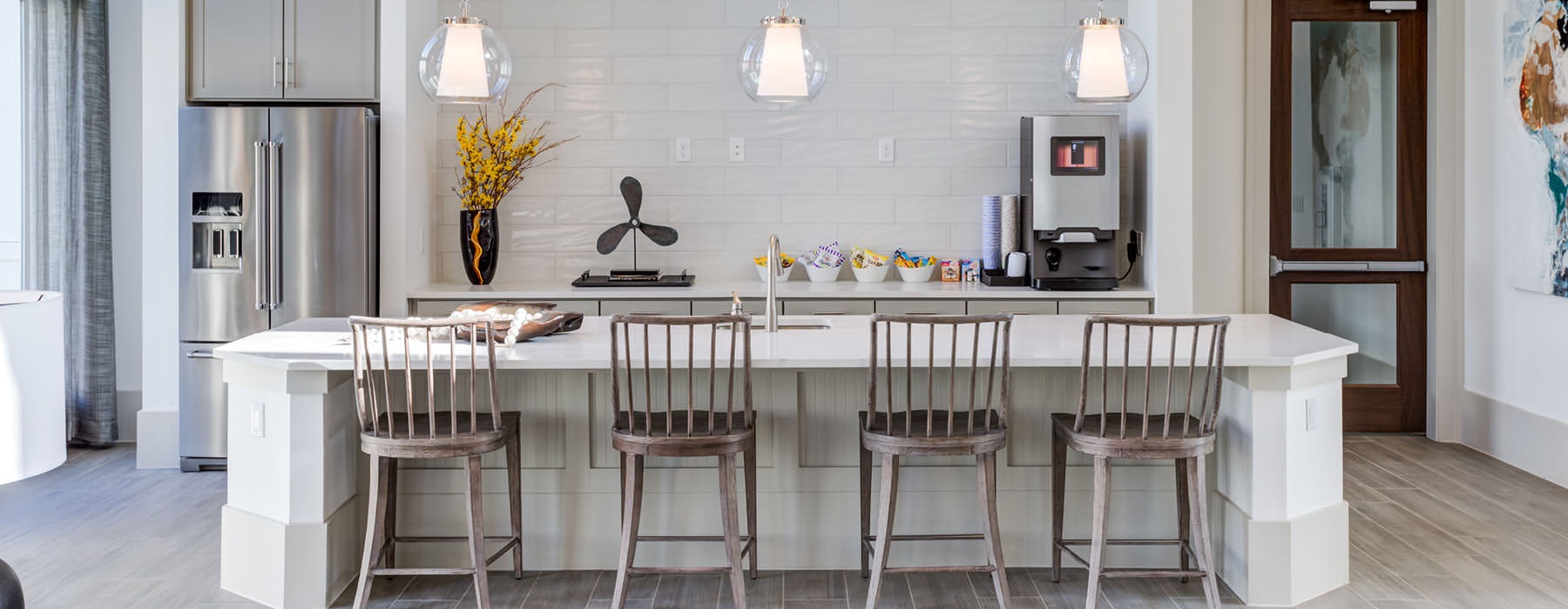 spacious clubhouse kitchen with large island